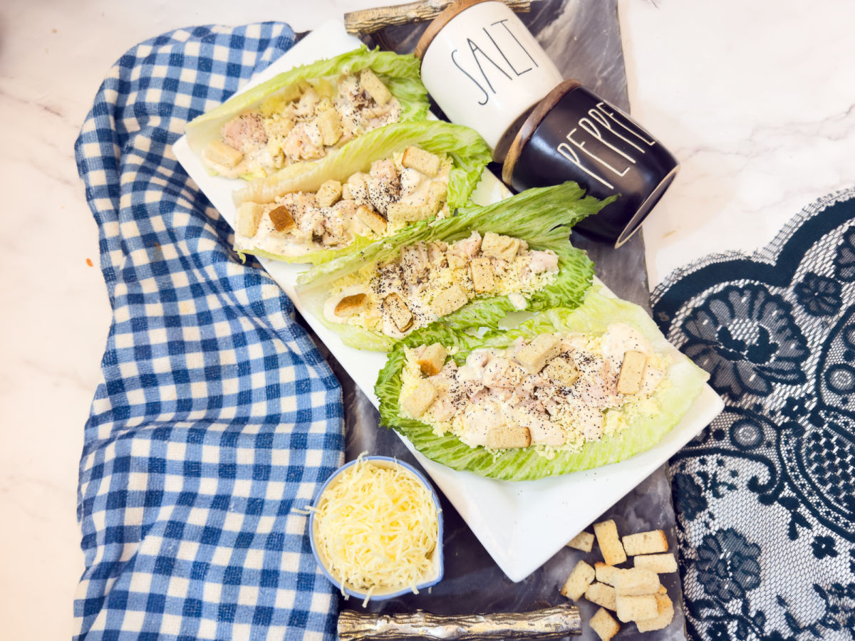 chicken caesar lettuce boats on platter