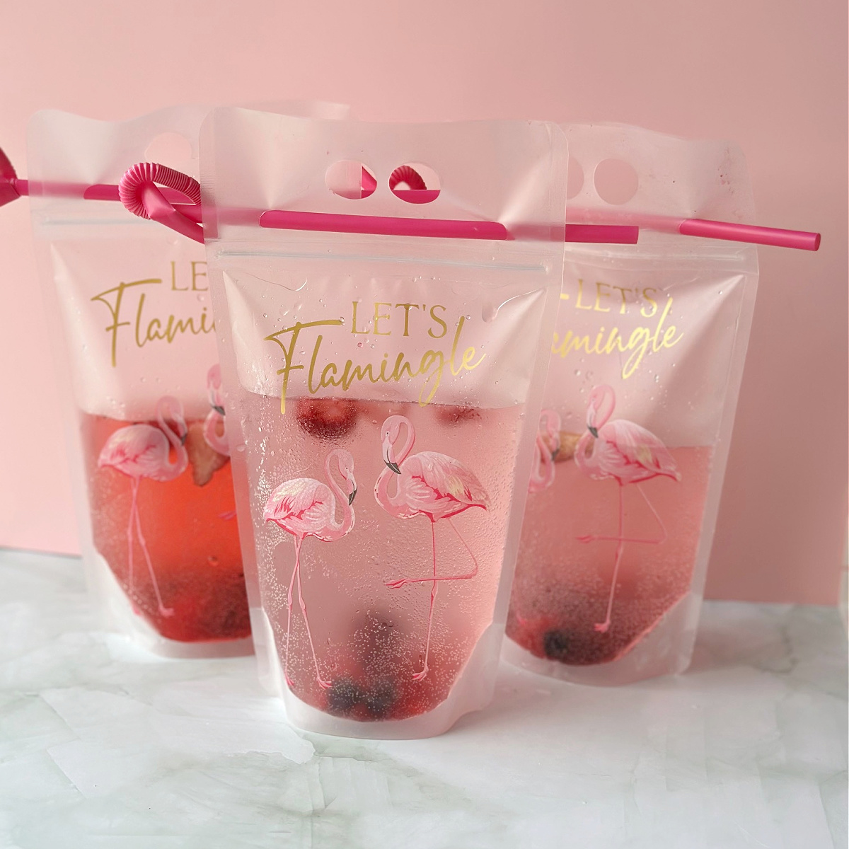 3 adult drink pouches with flamingos