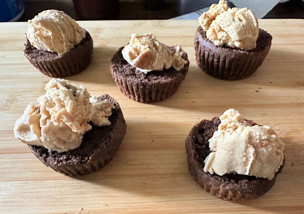 spreading ice cream on mini cake