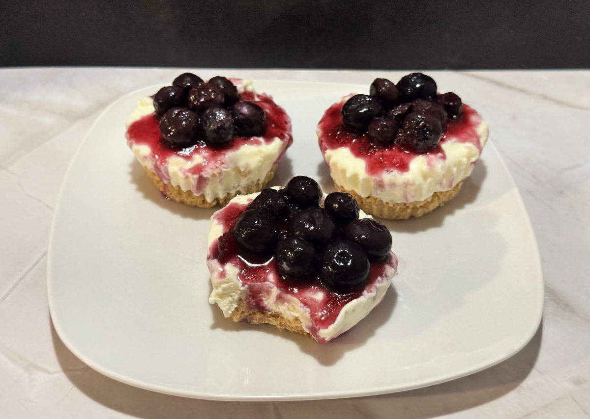 no bake mini cheesecake bites on white plate