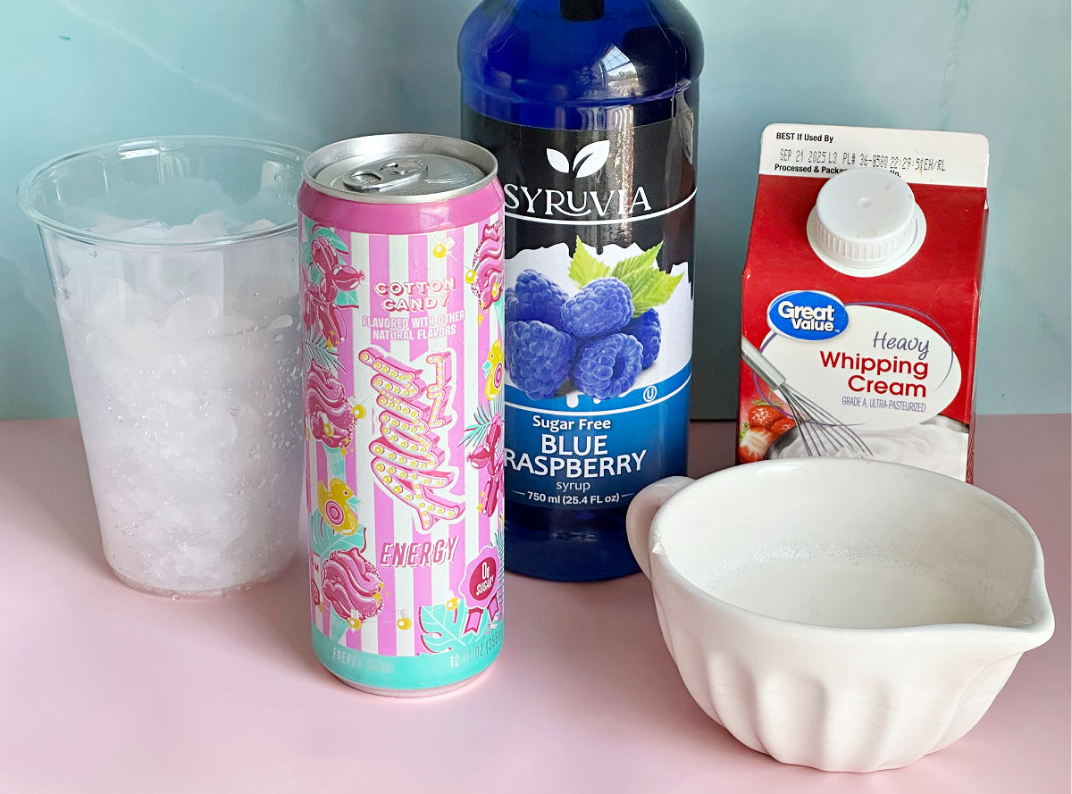 ingredients for Cotton Candy Dirty Alani Drink with blue raspberry syrup
