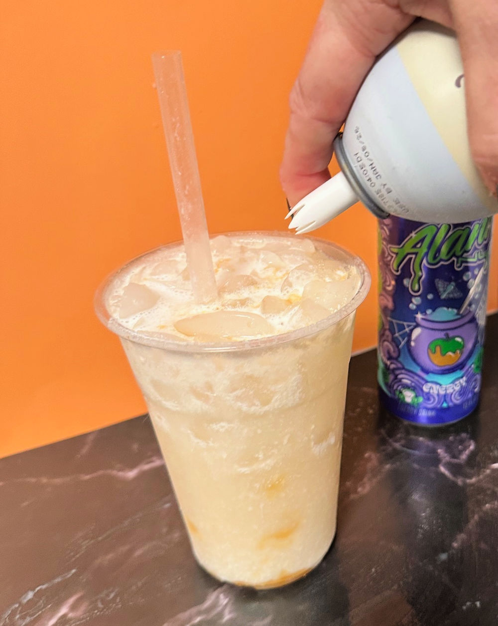 adding cream to dirty alani witches brew