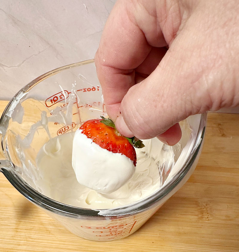 dipping strawberries in chocolate