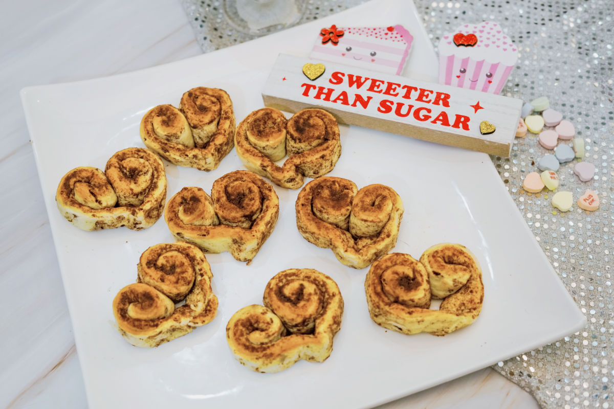 heart shaped cinnamon rolls on plate